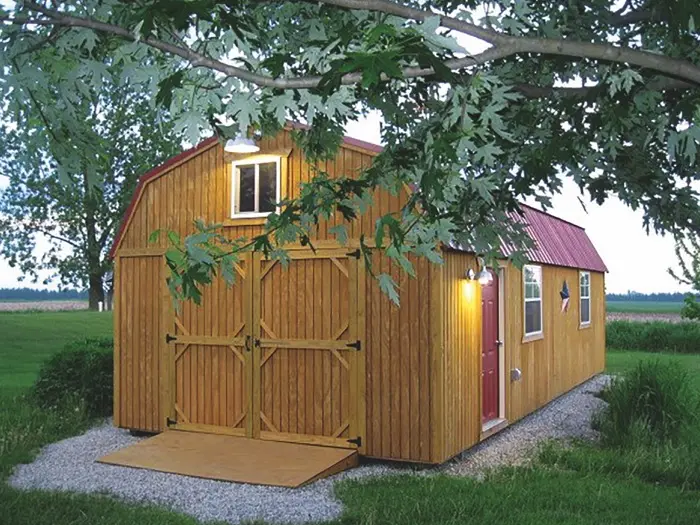 lofted barn with shingled roof