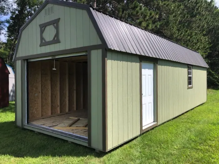 lofted garage with side door