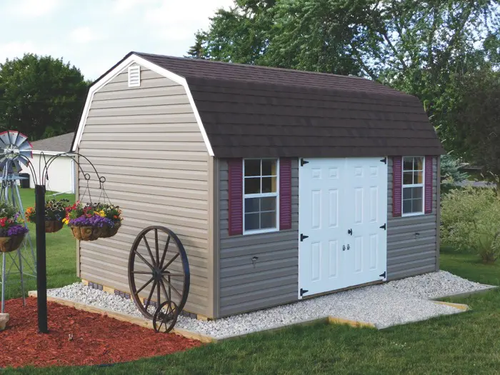 vinyl sided lofted garden shed with metal roof